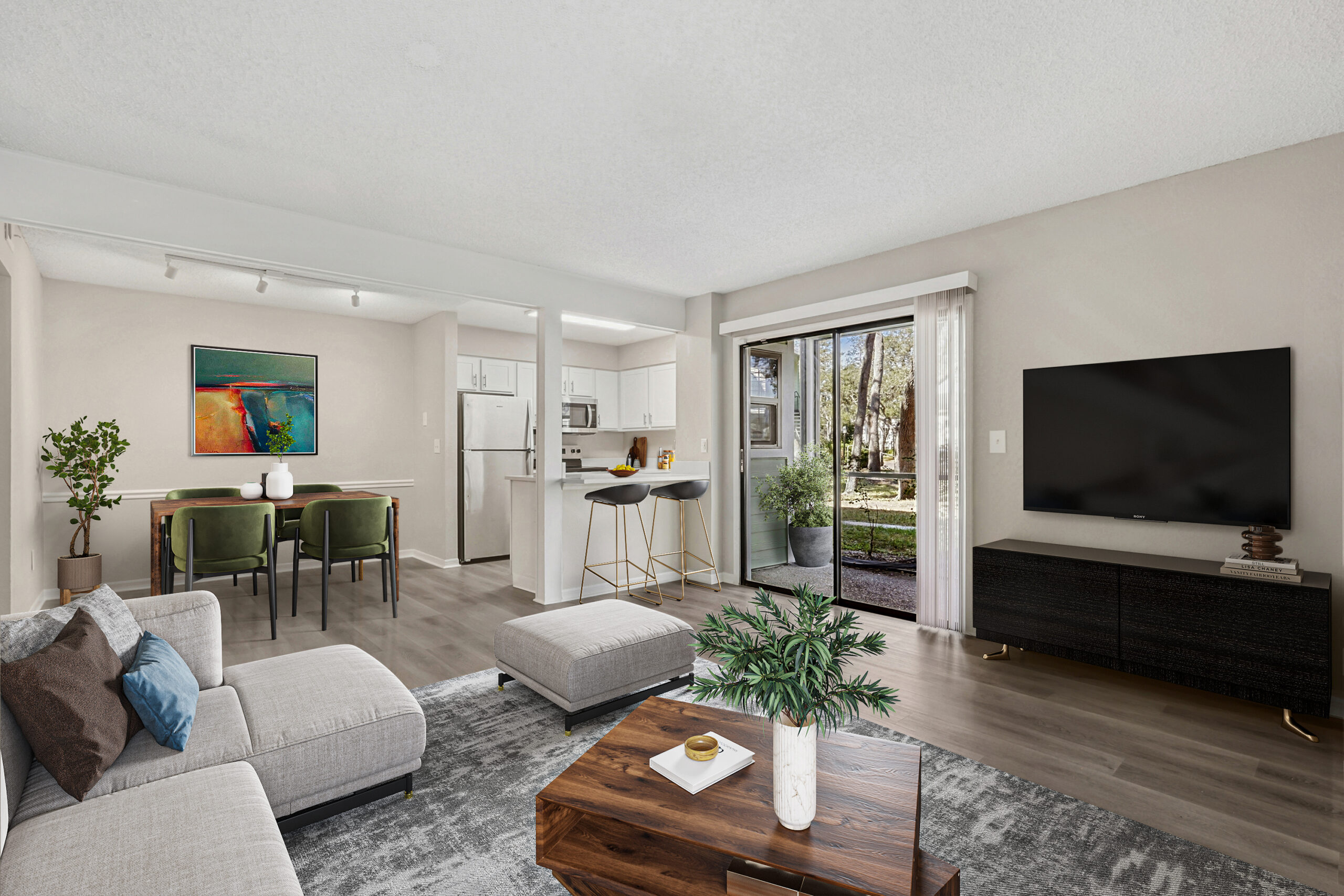 Newly-renovated, spacious home with outdoor patio, stainless steel appliances, and plank flooring
