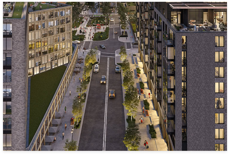 aerial view of the street beside a modern apartment building with a rooftop patio