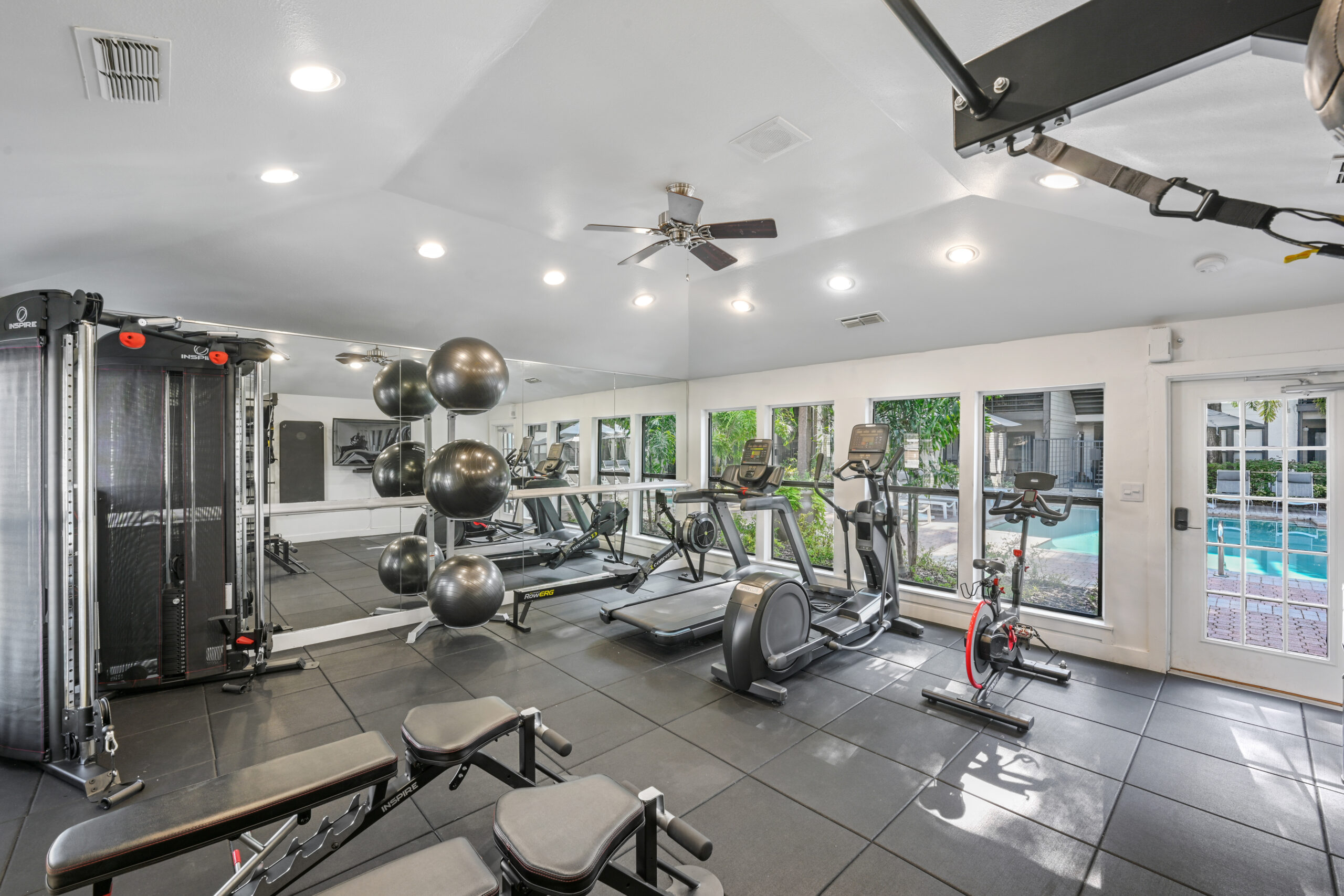 Fitness center with free weights and cardio machines