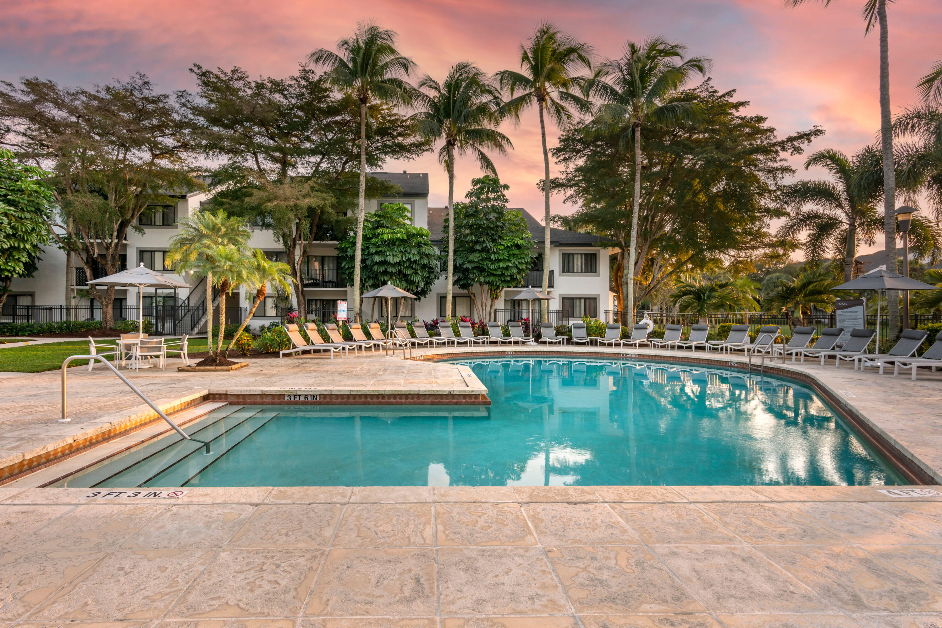 Outdoor pool with sundeck along with lounge seating