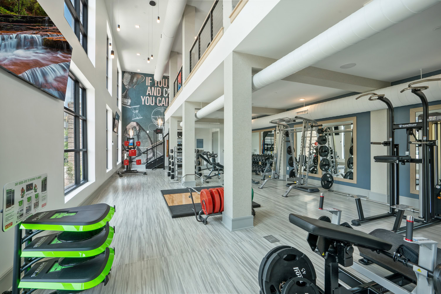 Two-level fitness center with ample strength and cardio machines