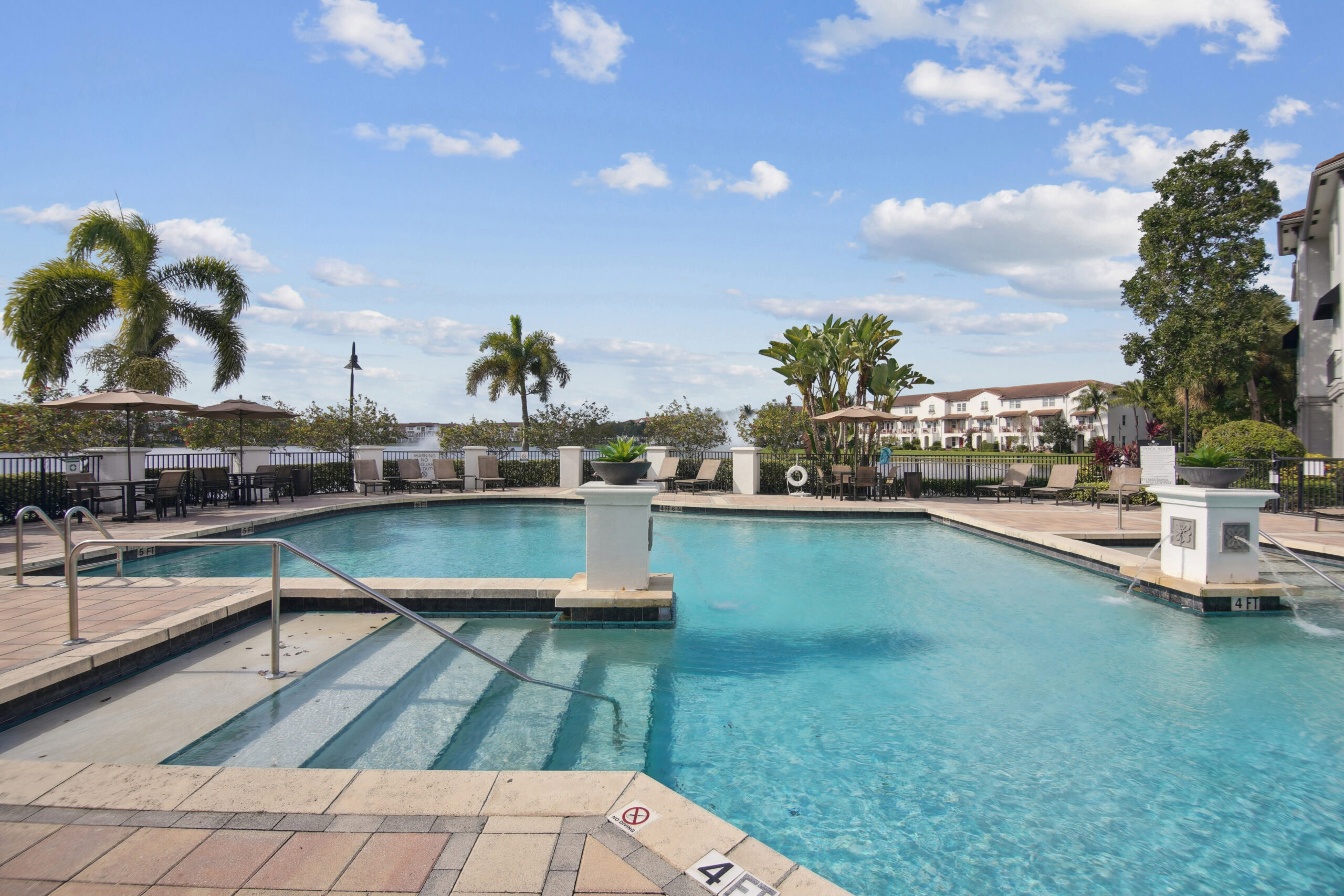 Resort-style pool in sunny Miramar Florida with sundeck
